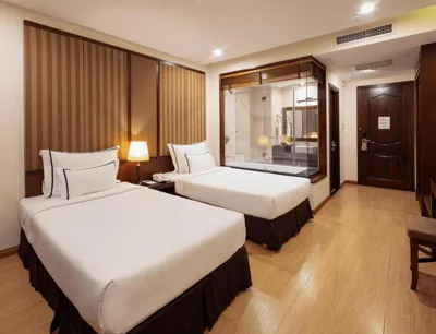 Camera Deluxe Twin con vista cortile — Paragon Saigon Hotel